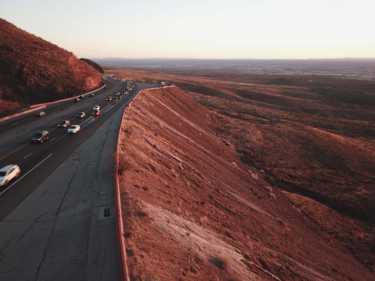 el paso aerial photography of road and mountain freeway